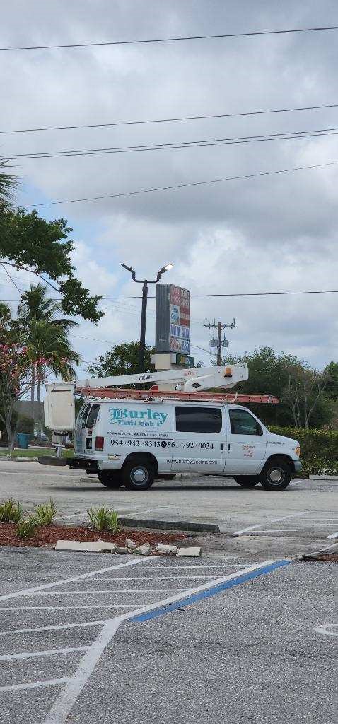 new-parking-lot-led-pole-lighting-with-our-lift-truck-2